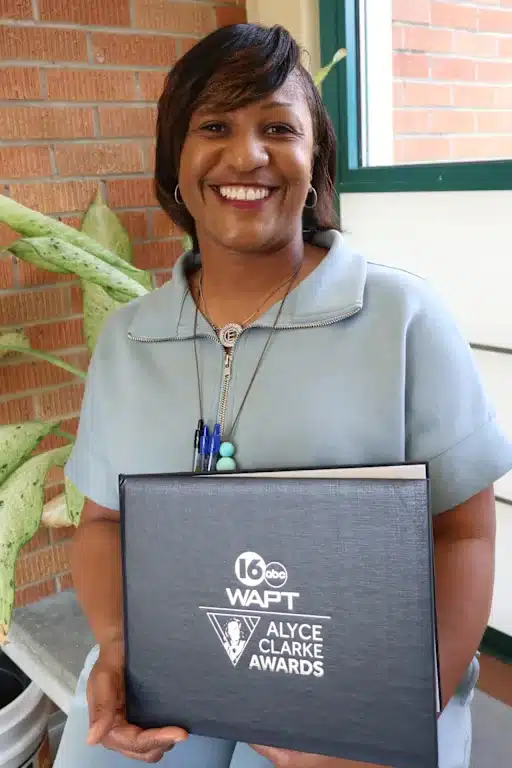 Veteran JPS educator Erica Taylor-Joyner surprised with Alyce Clarke Award